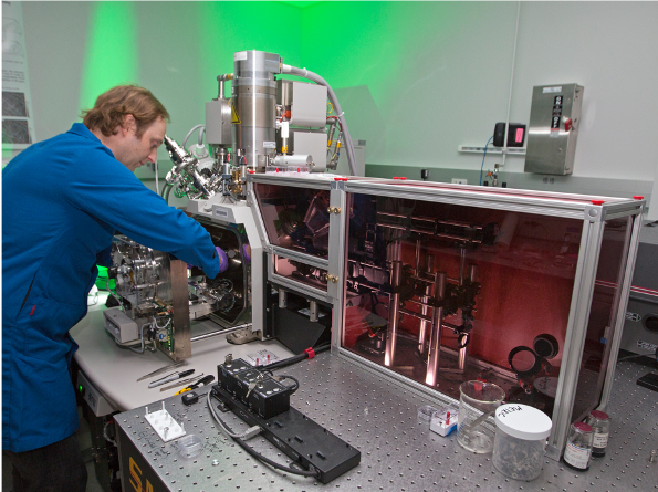 Scientist using the tri-beam laser instrument